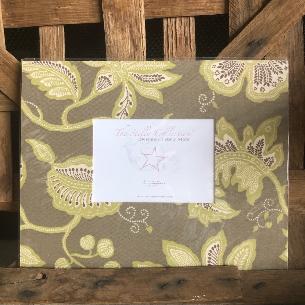 New 11 x 14 Designer Fabric mat with a opening for 5 x 7 image comes shrink wrap